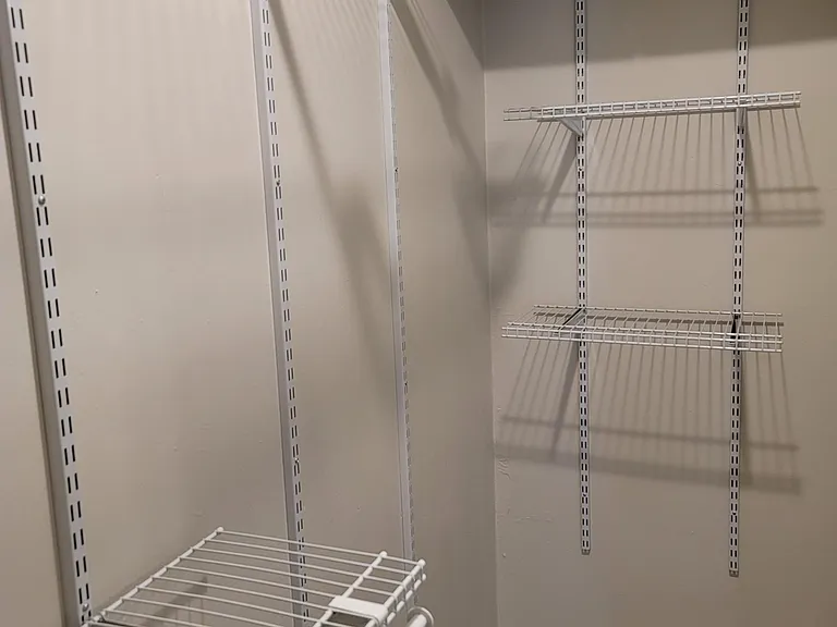 Primary custom walk in closet, second view.
8'4"x3'