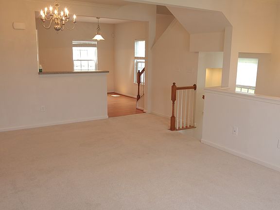 Oversize living room with half bath.