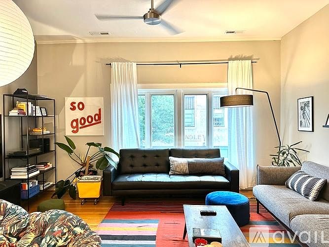 Living room with operable windows with screens.