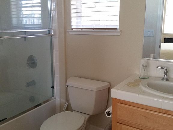 Large shower with tub.