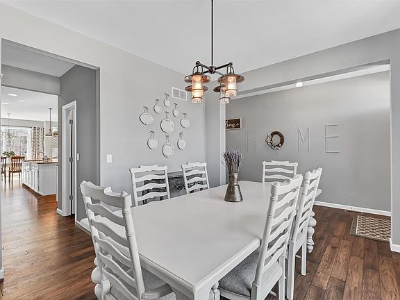 Easy access to the kitchen and pantry and you will love the lighting fixtures.