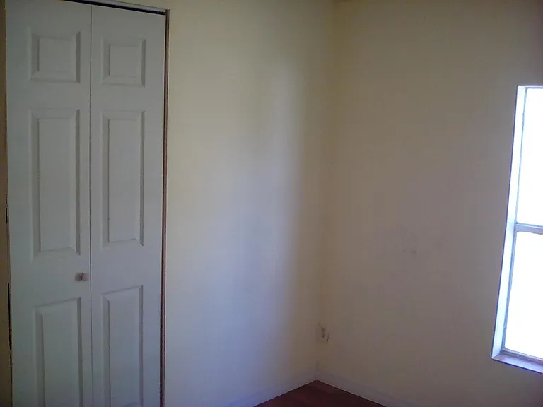 3rd Bedroom with walk in closest and new wood flooring