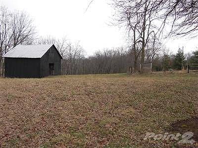 This is a 55 acre farm that backs up to Elkhorn Creek.  Part of the farm is 40 or 50 feet above the creek to overlook the creek.  Of the 55 acres about 35 or 40 acres is out of the flood plain and can be deveoped as R-1-C Residential ( approx 4.4 units per acre). This land also is inside the city limits and zoned now as farm land.
