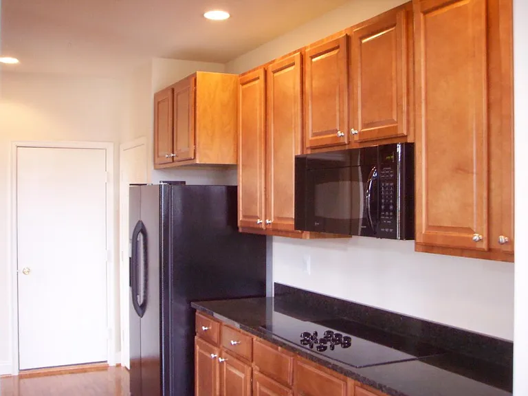 Kitchen cabinets side 1