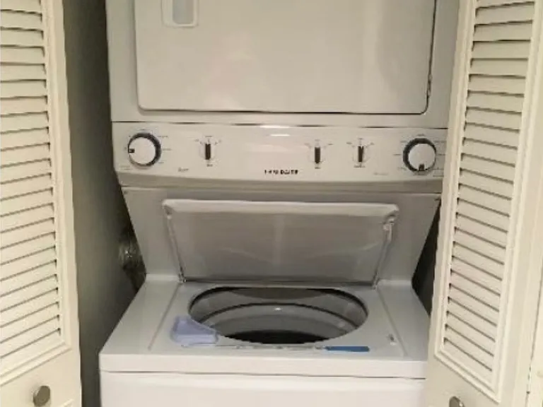 The full size washer and dryer off of main bathroom and near guest bedroom. This condo also has a utility closet filled with many tools, cleaning items, beach & portable chairs, and so much more!