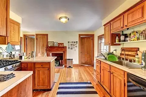 Kitchen and door to 3rd bedroom on the right and bathroom on the left