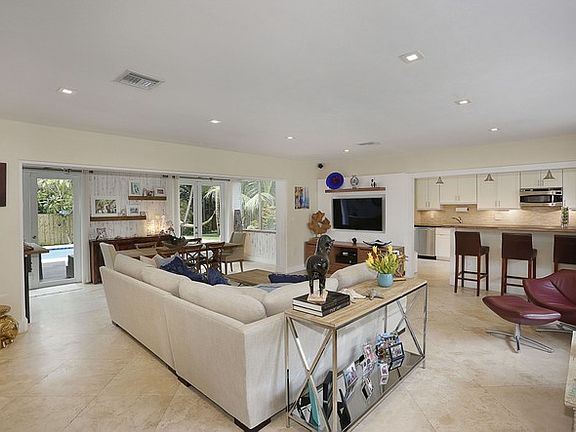 A Great Room Opens Up Onto Kitchen