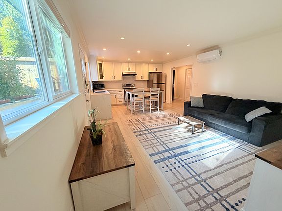 Full view of the living space. Picture taken from the entry of the primary suite.