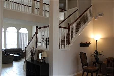 Grand entrance and open floor plan with tile throughout 1st floor
