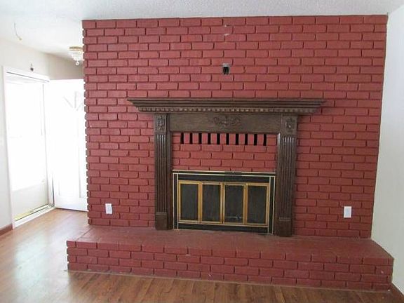 Brick w/Wood Mantle
