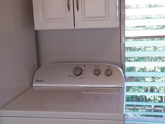 Utility cabinet for washer and dryer.