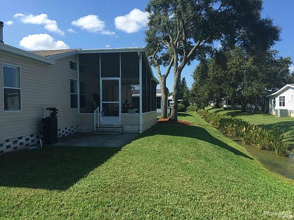 Back of the Home with a water softner