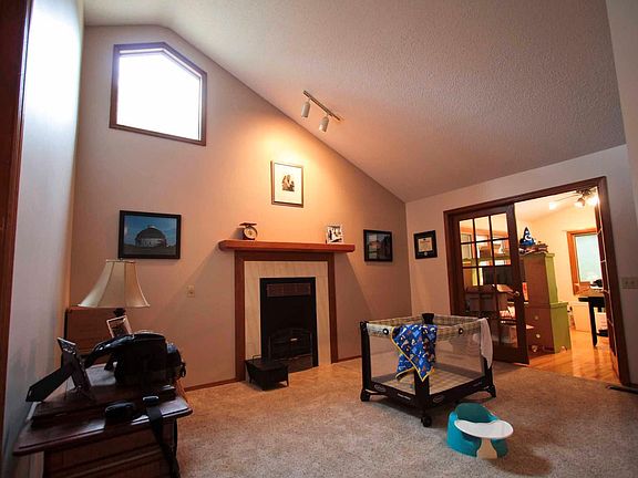 Cathedral ceiling fireplace living room