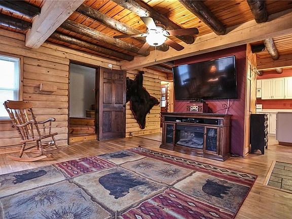 Living Room (photo 2-of-3) - view with kitchen in the background.