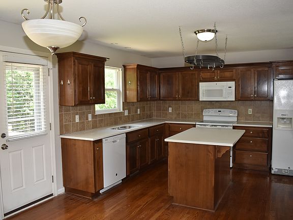 Kitchen new quartz counters. New lighting.