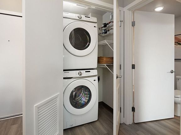 Stacking washer and dryer in every unit