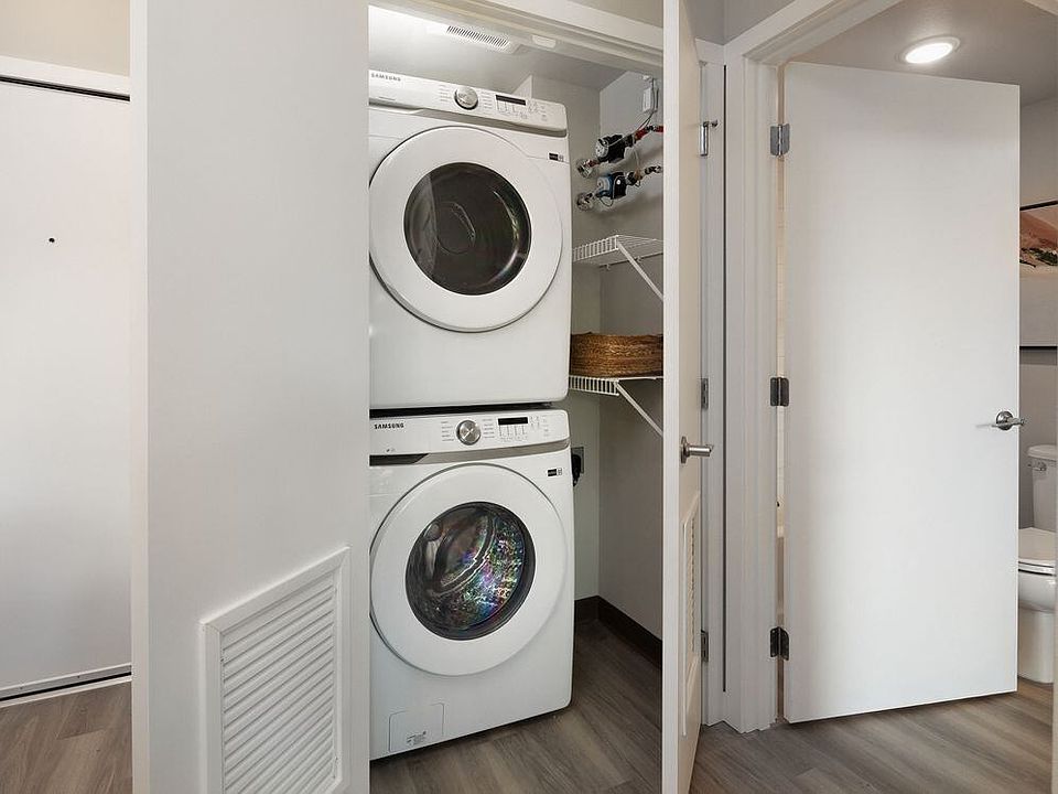 Stacking washer and dryer in every unit