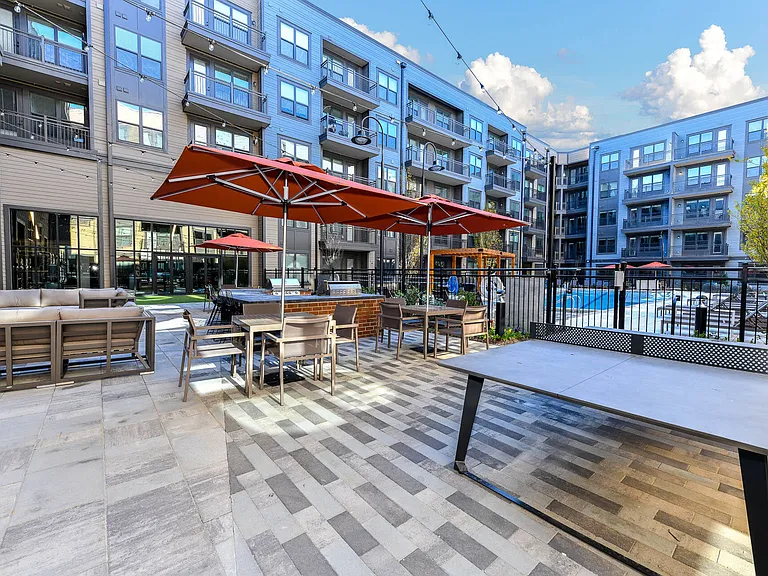 Outdoor bar with built-in grills.