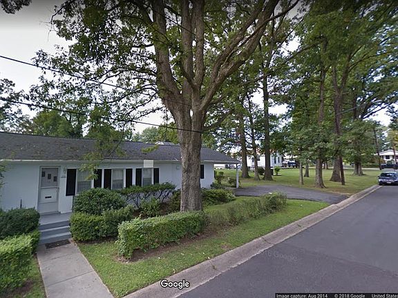 including large yard on the side of the house