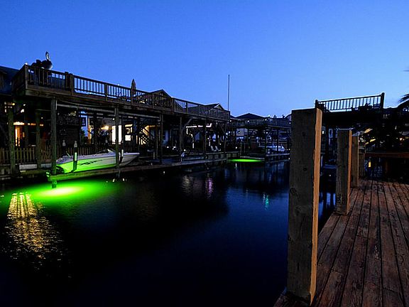 A view of the canal just after sunset. Great lighting from the boat lift across the canal.