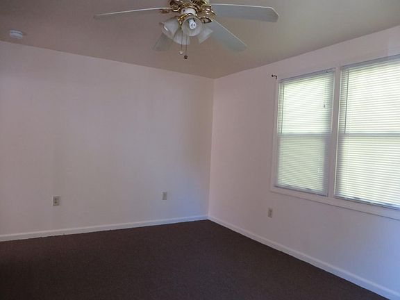 Newly Carpeted LR with ceiling fan