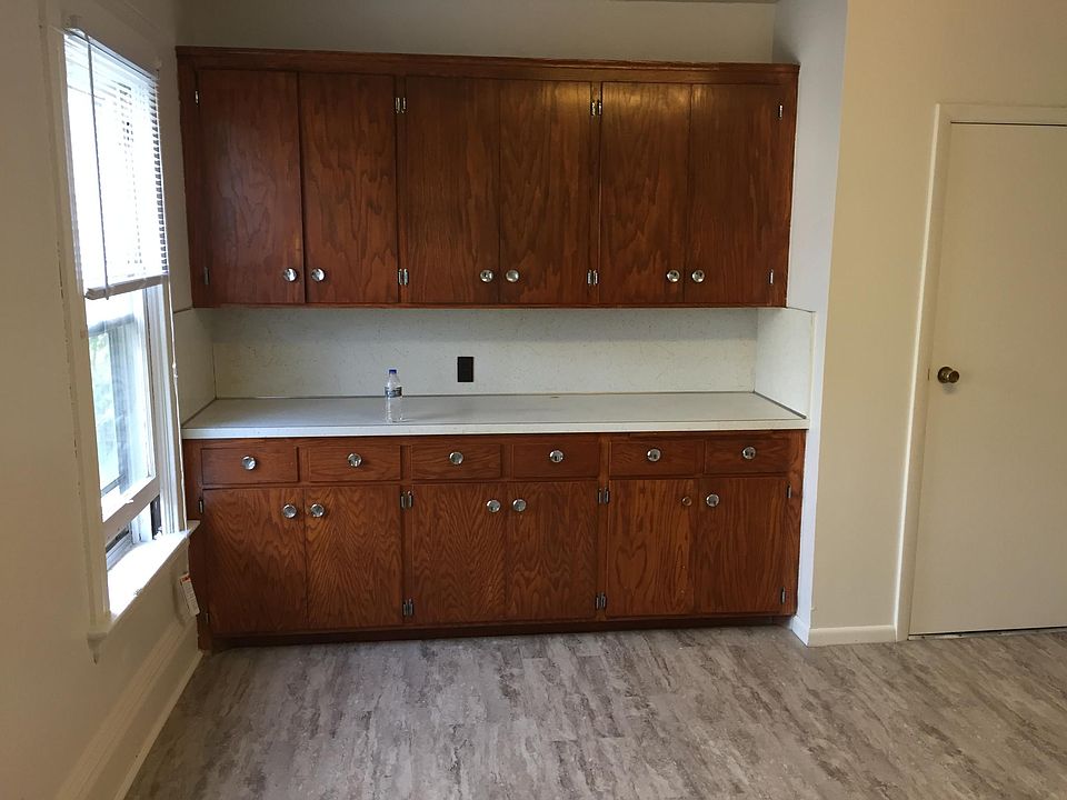 Kitchen cabinets and pantry.