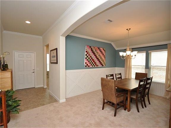 The tall ceilings have recessed lighting throughout and architectural interest can be found as well.