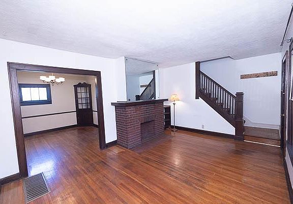 Front living room into dining room and stairs