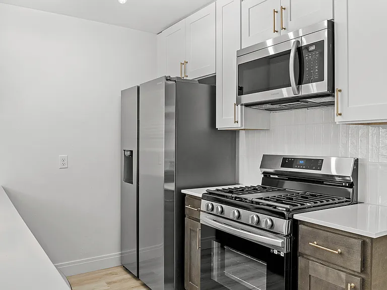 Stainless Steel Appliances + Quartz Countertops Stainless Steel Appliances + Quartz Countertops
