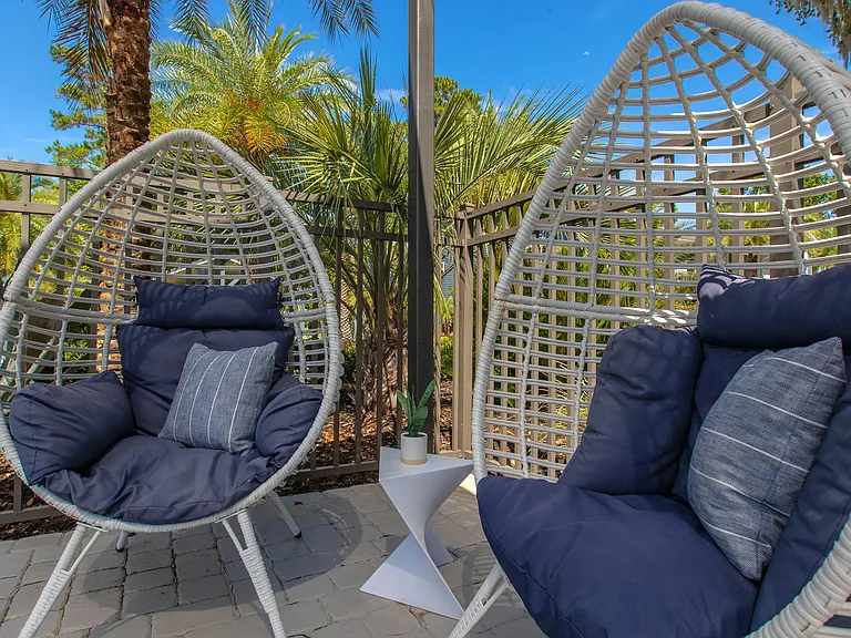 Our resort-style pool deck is surrounded by sleek and inviting seating options, offering a perfect spot to unwind with style.