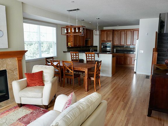 Living room flows into dining room.