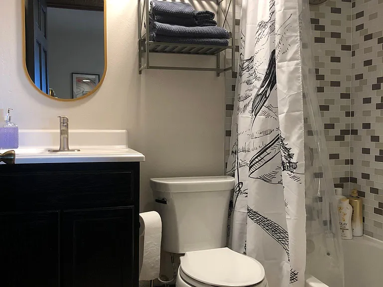 Private bathroom off of Queen #1 bedroom.