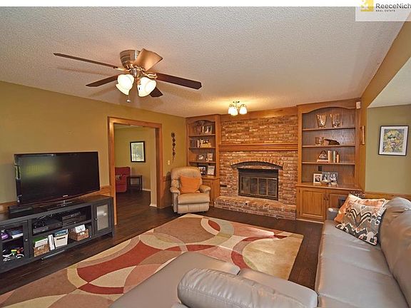 Great Room with Cozy Brick Fireplace