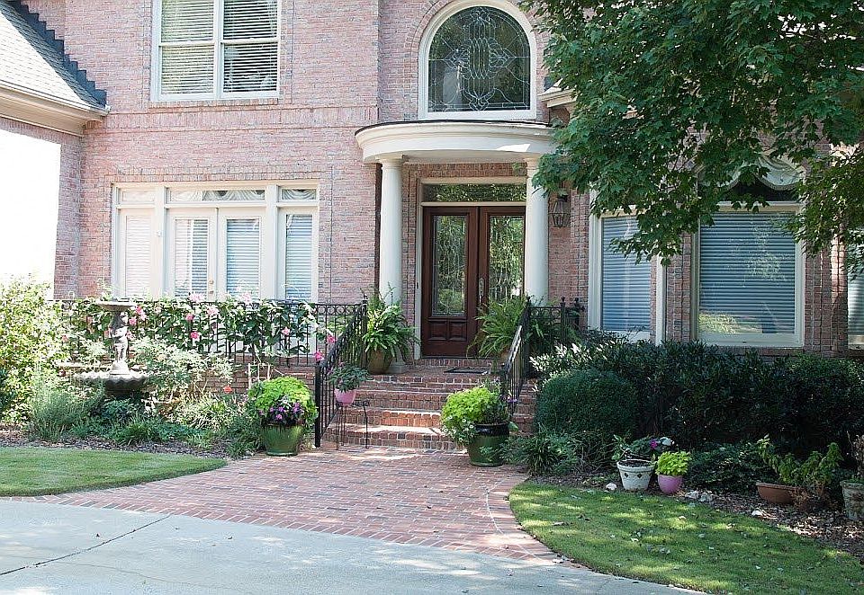 All brick, traditional home.