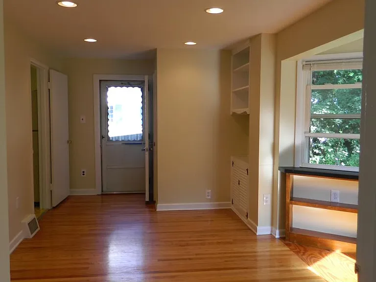 bright sunny bonus room overlooks backyard and park