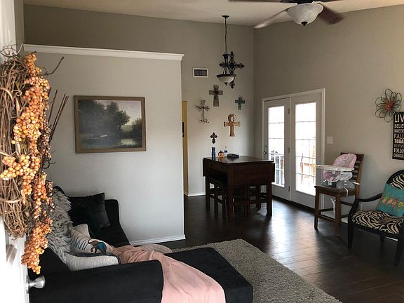 Living room looking into dining area