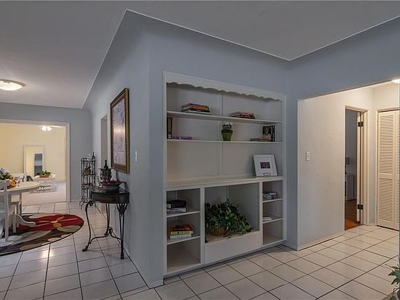 Built-in bookcase adds to the authentic mid-century charm!