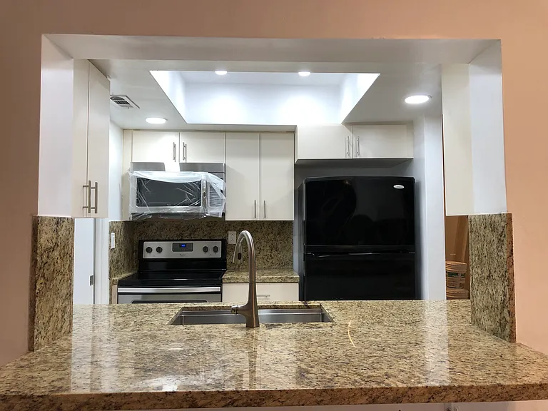 Whirlpool SS/BK Appliances/ Microwave, range, and fridge