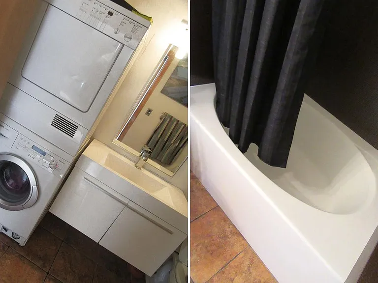 bathroom with washer and dryer