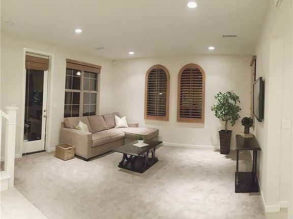 Cozy living room with many windows allow abundance of light