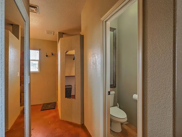 Master Bathroom entrance. Large walk in closet on the left