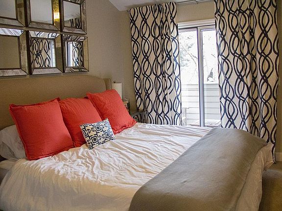 Large master bedroom with second balcony access and on suite