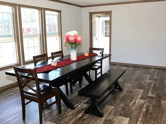 Well illuminated dining area with tons of natural light.