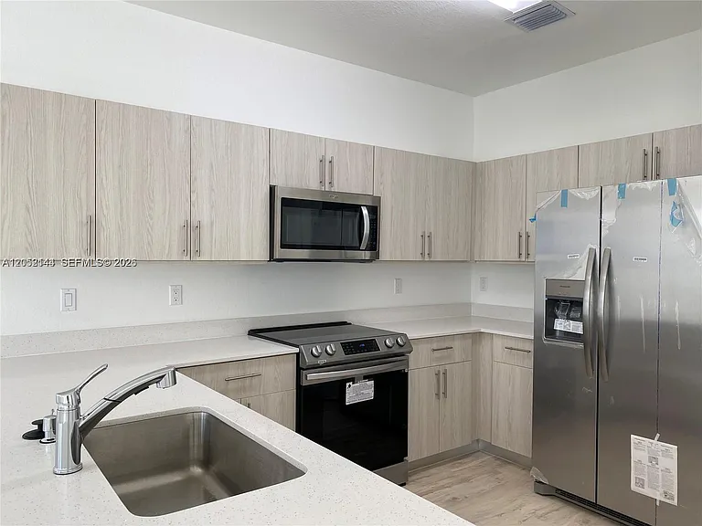 15540 SW 136th St #105 — Photo 5