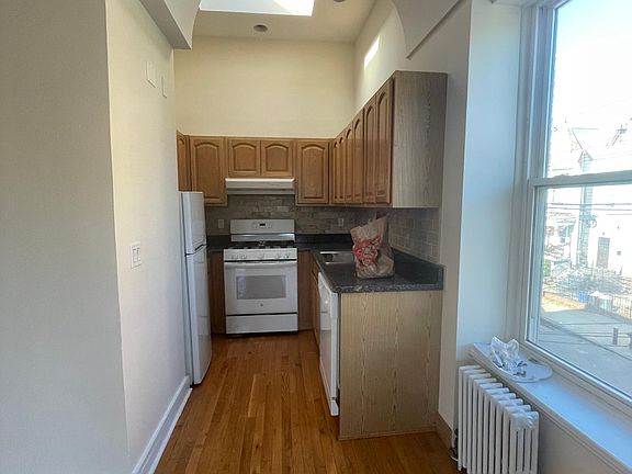kitchen with skylight and dishwasher
