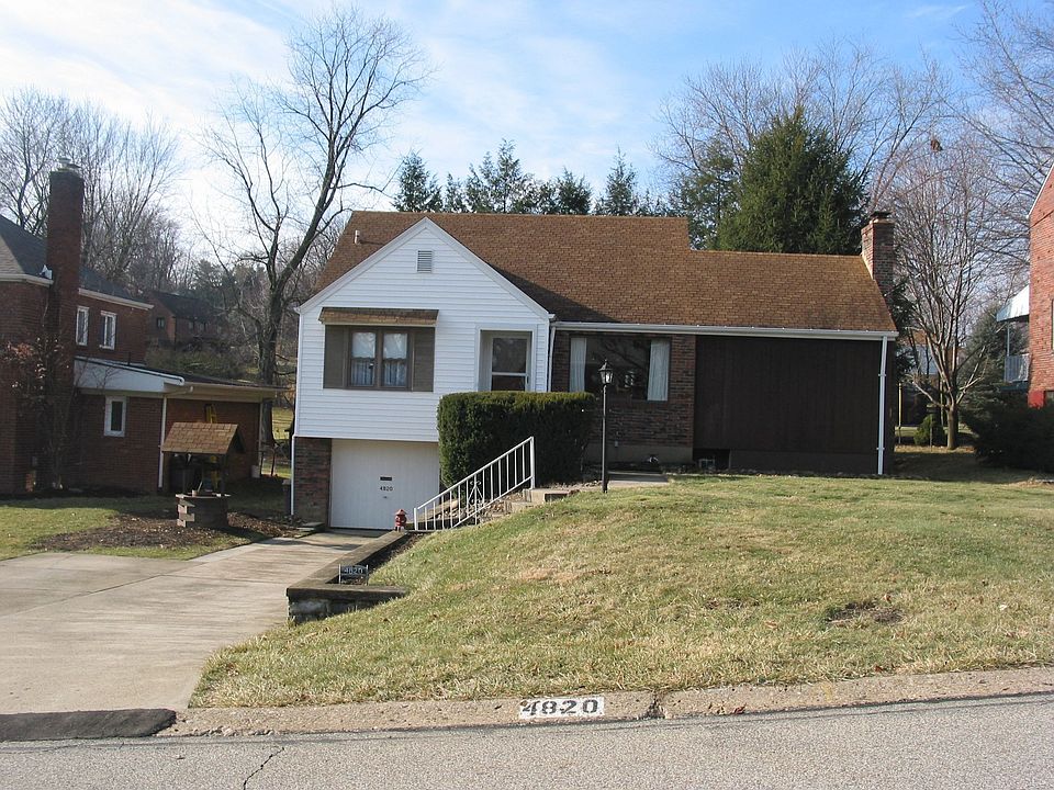 Level front double concrete driveway