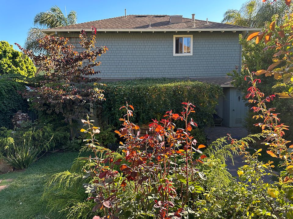Yard and grounds; rear of unit; kitchen window
