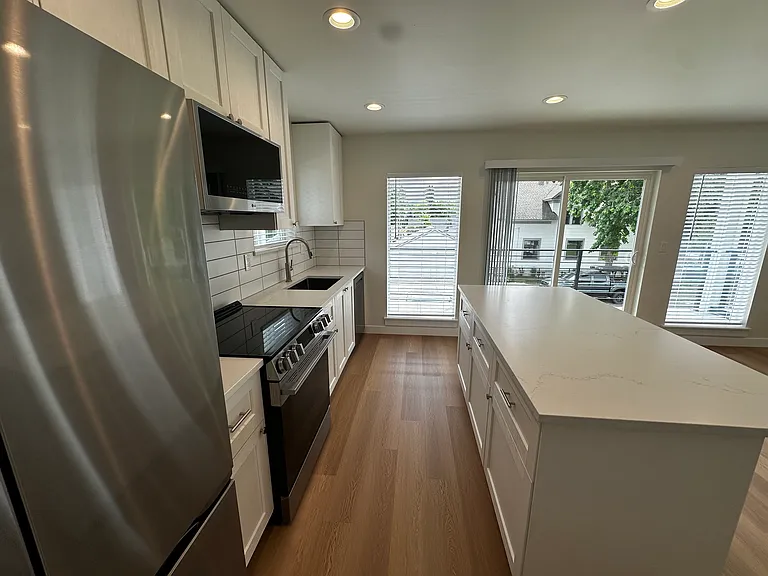 Kitchen with new appliances.