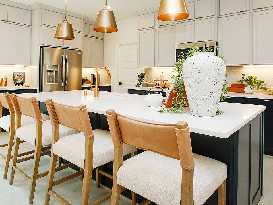 Luxurious Bridgeland Central kitchen with chic pendant lighting, quartz countertop, and leather seat
