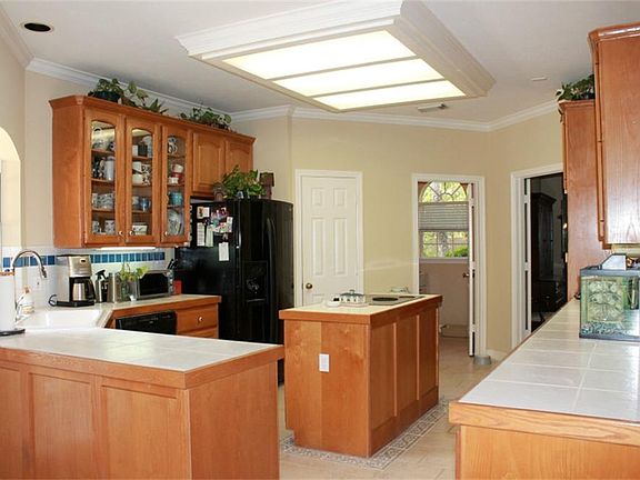 The island kitchen has a ton of cabinet and counter space.